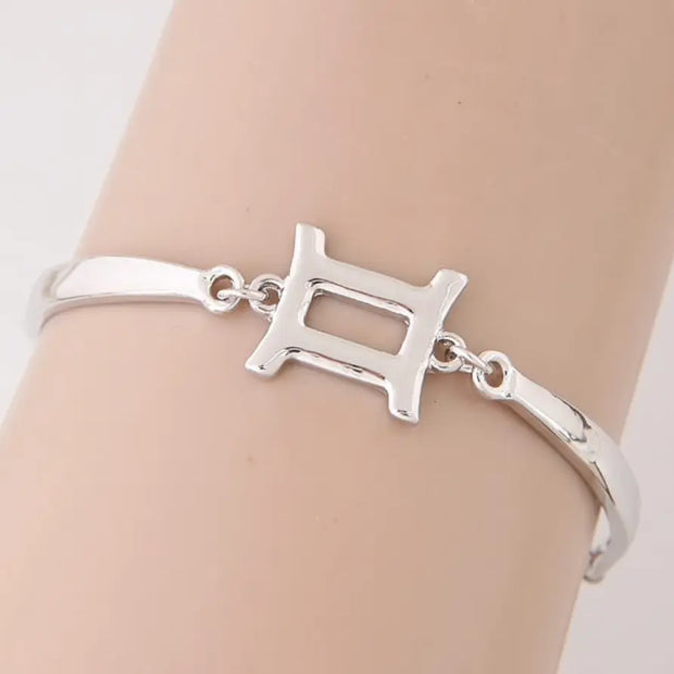 Silbernes Sternzeichen-Logo-Armband - Sternzeichen-Anhänger.de